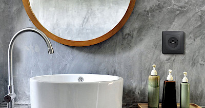 Розетки Schneider Electric для кухні та ванної: вологозахищені рішення